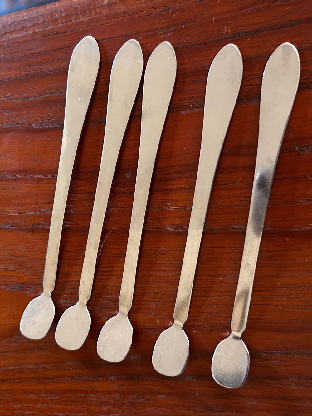 Set of five vintage Sveico stainless drink/coffee stirrers. Made in Sweden.